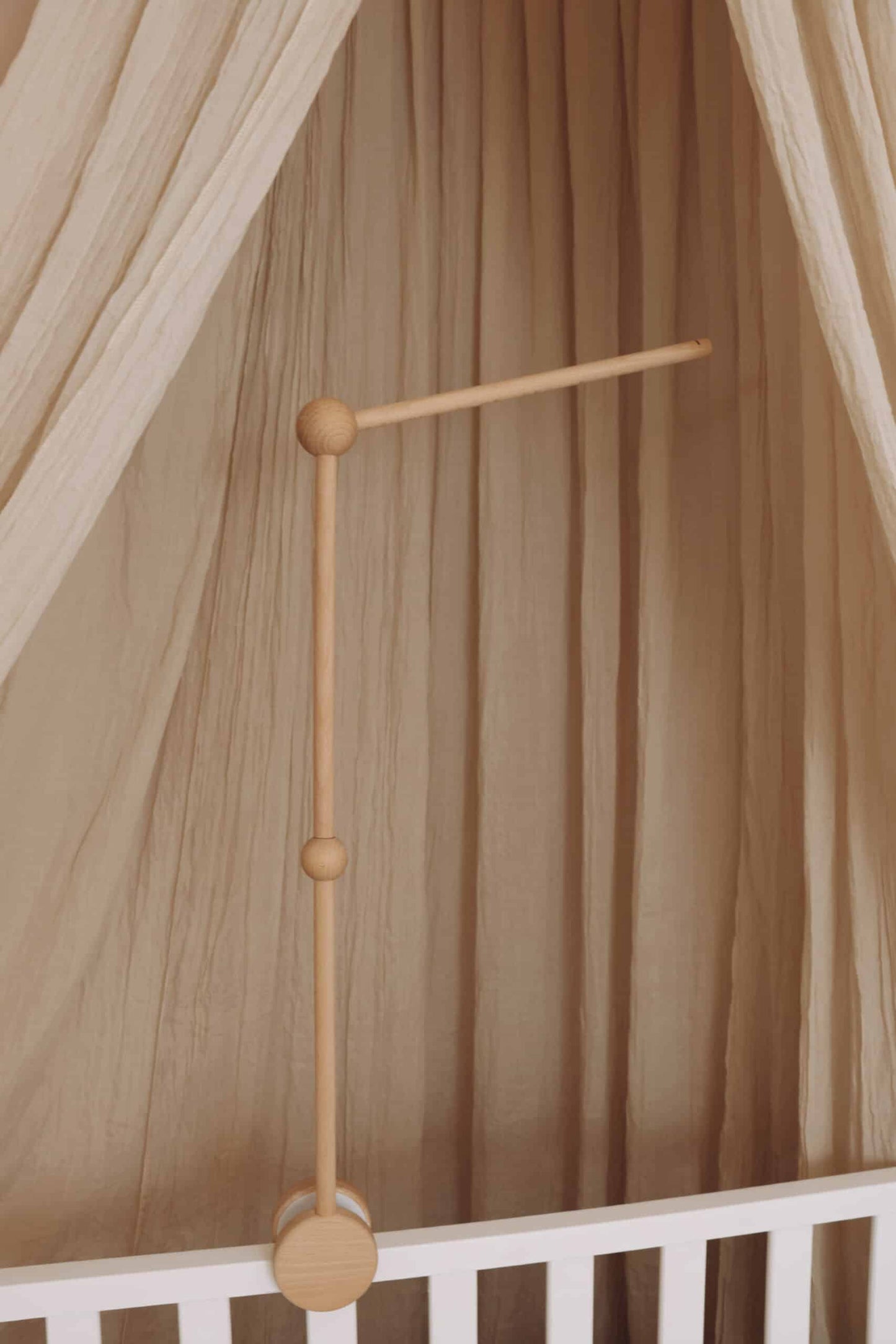 Wooden baby mobile arm fixed
