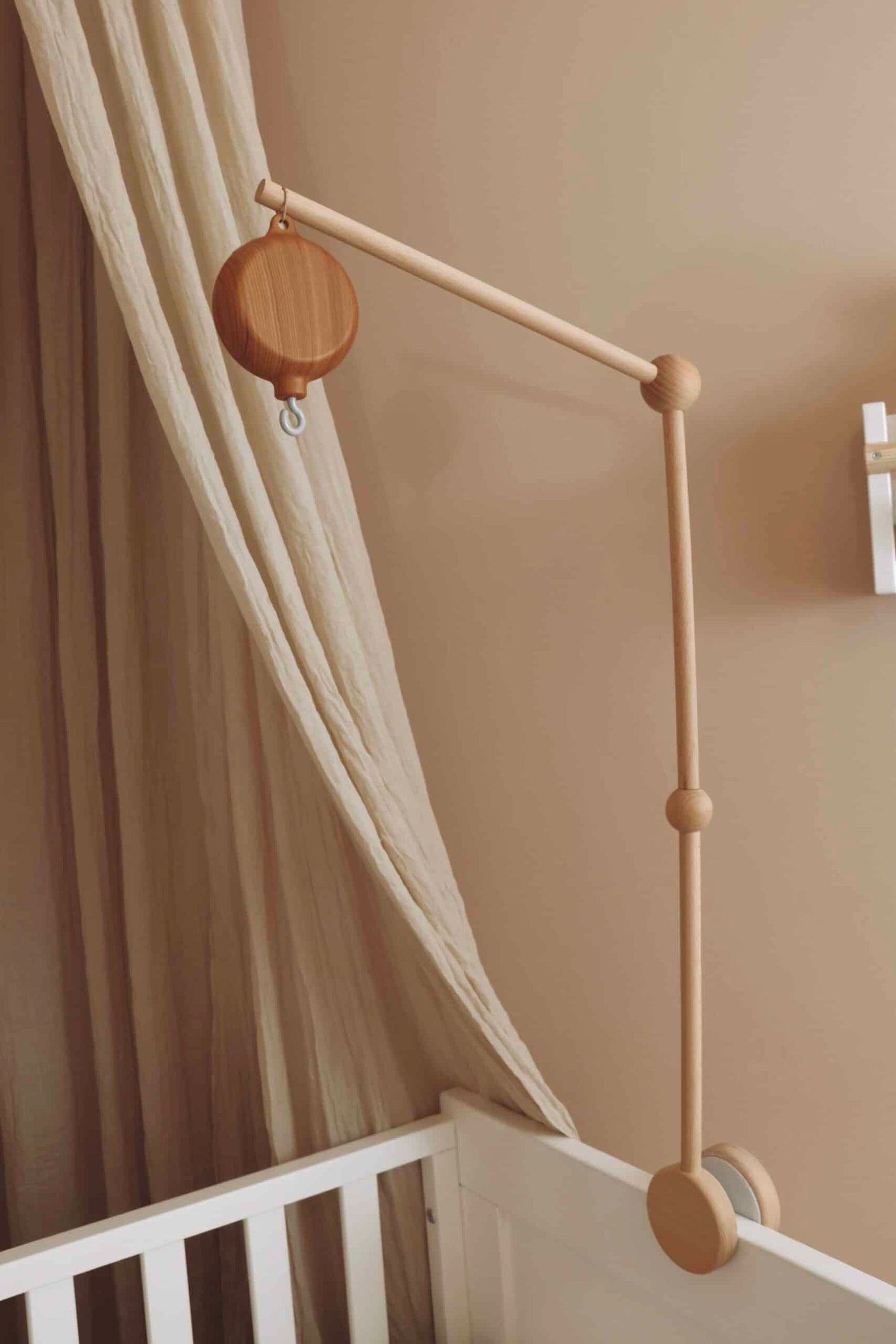 Wooden baby mobile arm fixed