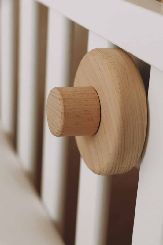 Houten babymobiel arm vast