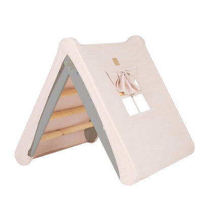 Grijs ladderhuisje met roze tent